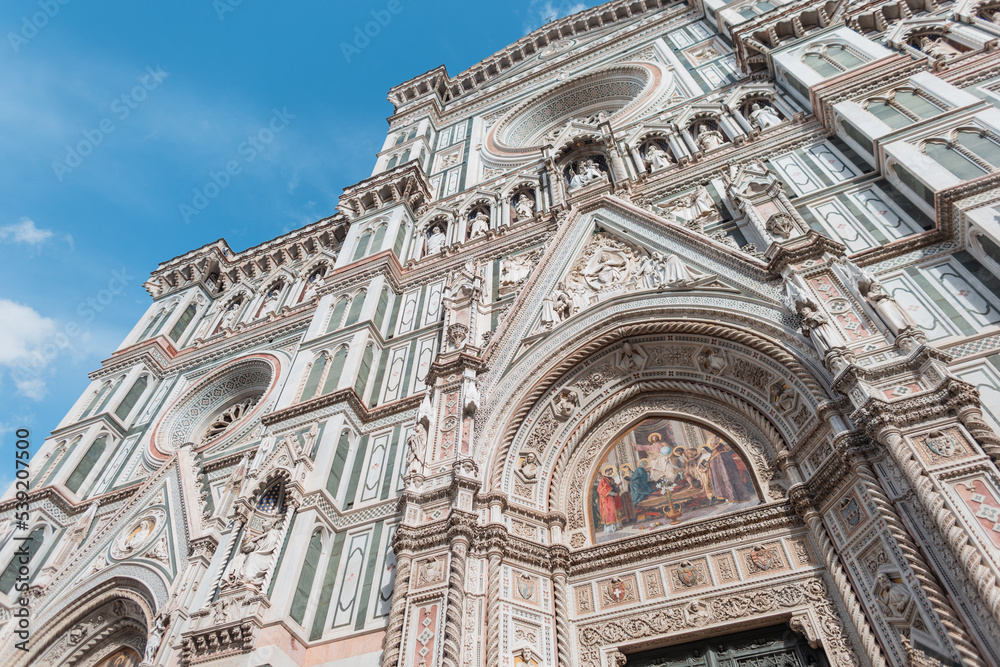 Beautiful amazing Gothic architecture of an ancient cathedral with icons in Florence, Italy
