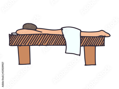 a simple drawing of a man lying on a massage table