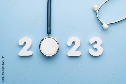 Stethoscope with 2023 number on blue background Fototapet