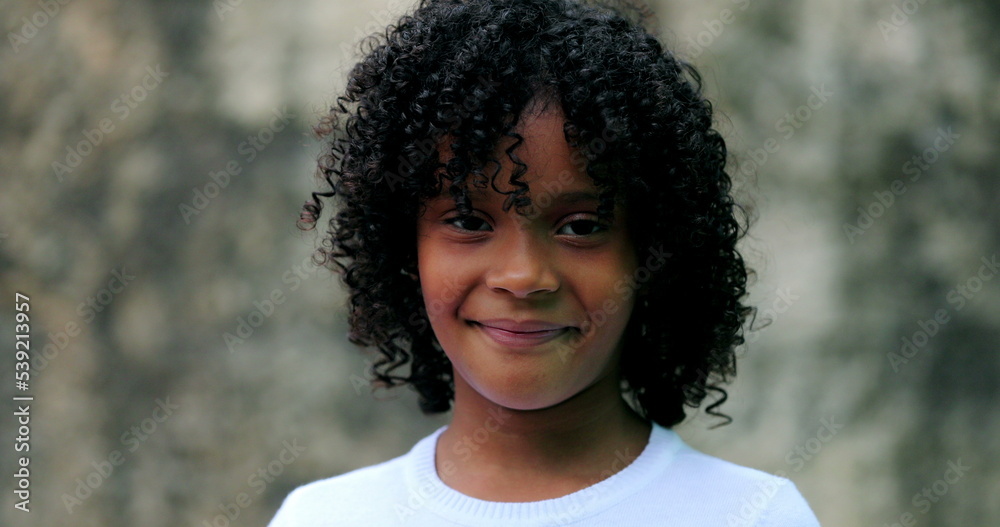 Happy Brazilian child portrait smile. Close-up face little kid Happy Brazilian child portrait smile. Close-up face little kid