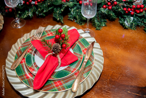 Table set to celebrate Christmas. Table setting to celebrate a festive Christmas dinner