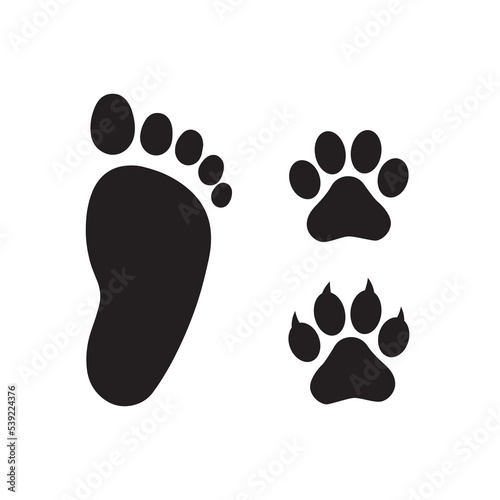 Human foot with dog and cat paw print symbol