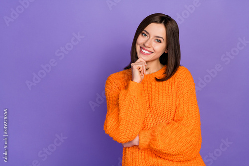 Portrait of satisfied glad lad hand touch chin beaming smile empty space isolated on purple color background