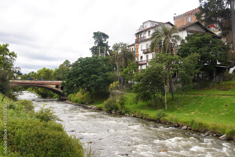 Riverbank of the Tomebamba river with colonial houses in Cuenca - Ecuador