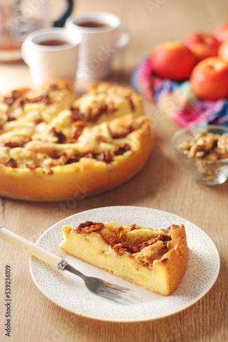 Apple pie with walnuts - typical autumn dish  © nastyakamysheva