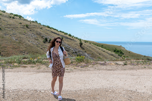 Hiker looking at the view at Calanques de Piana in Corsica  France