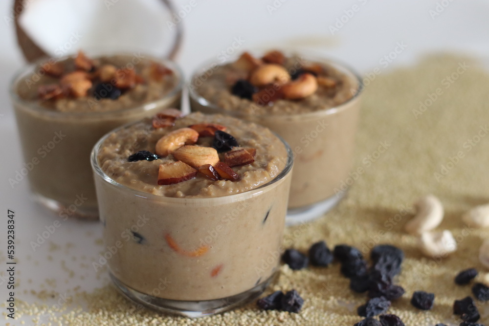 Brown top millet payasam. Pudding or Kheer or payasam made of brown top millet, jaggery and coconut milk, flavored with cardamom. Brown top millet payasam. Pudding or Kheer or payasam made of brown top millet, jaggery and coconut milk, flavored with cardamom.
