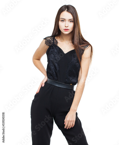 Full body, beautiful brunette woman in a black blouse and pants