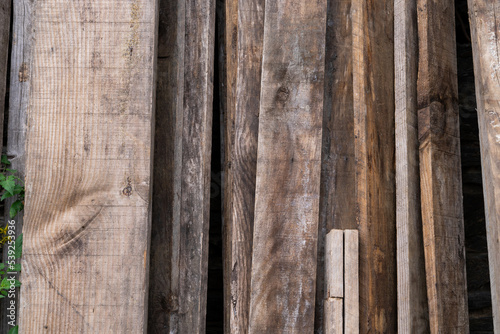 Background of stacked rustic boards. Copy space. photo