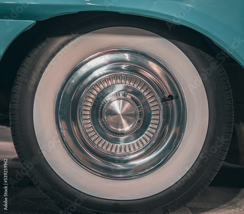 Elegant vintage retro car. Vintage wheel of classic car © Anders