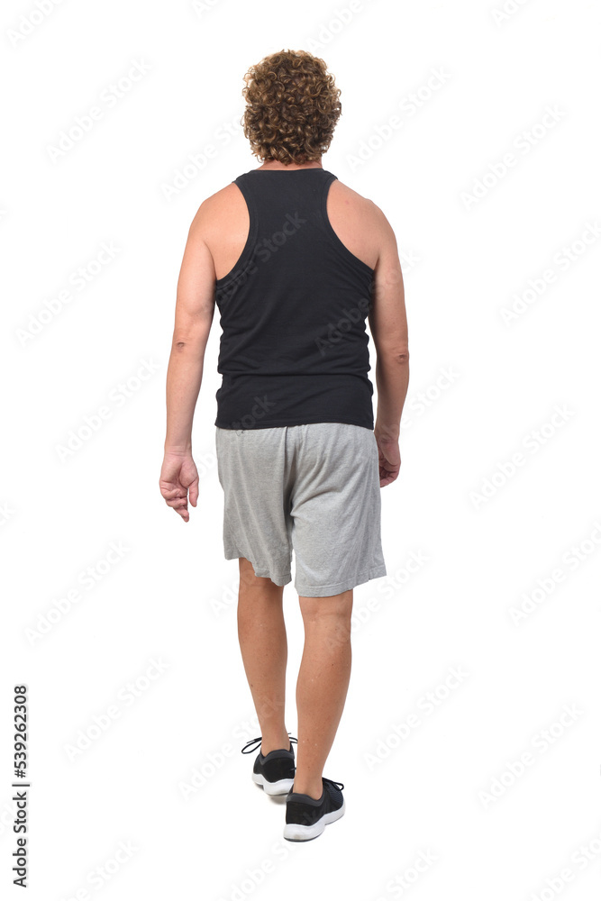 back view of a man with sportswear walking on white background back view of a man with sportswear walking on white background