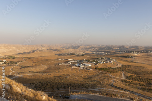 Mount Herodion and the ruins of the fortress of King Herod inside an artificial crater. The Judaean Desert, West Bank. High quality photo © gidon