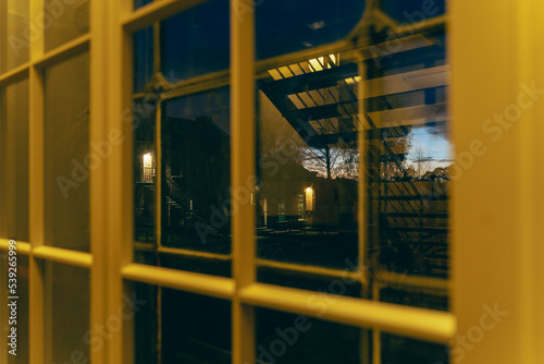 evening outside the yellow window photo