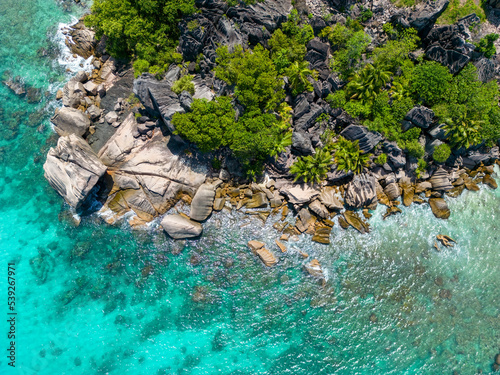 Drone view Anse Source d'Argent, La Digue Seychelles, tropical beach during a luxury vacation in Seychelles. Tropical beach Anse Source d'Argent, The most beautiful beaches in the world 