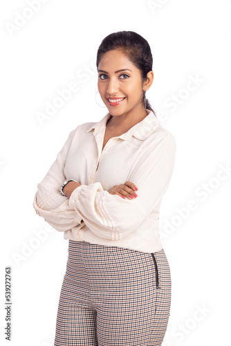 Cheerful hand crossed Indian young business woman isolated on white.
