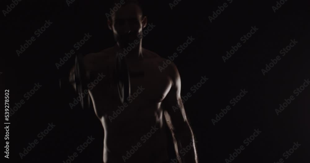 Finishing with his exercise while being topless Finishing with his exercise while being topless