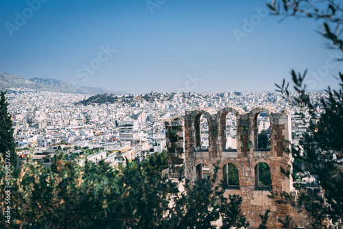 Fototapeta Naklejka Na Ścianę i Meble -  Athens Skyline: Fragment of Collapsing Building Amidst Mediterranean Urban Panorama