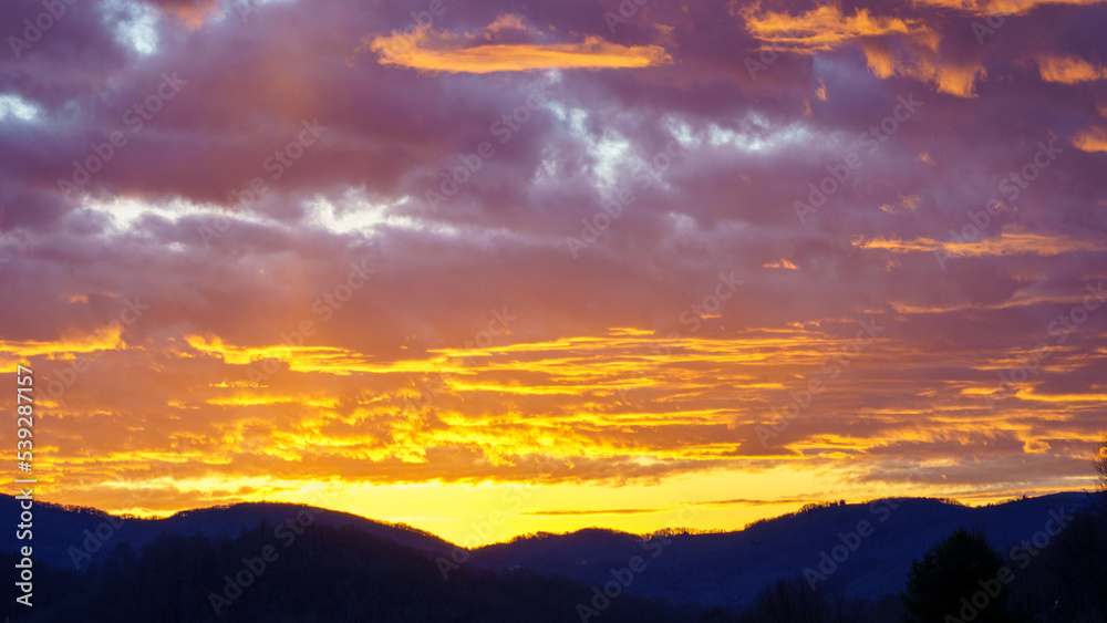 Fototapeta premium Clouds and Sunsets