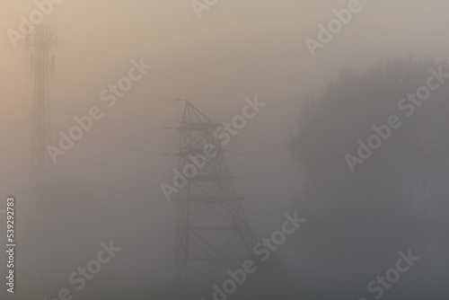 Obraz na płótnie Power lines in the morning fog w salonie