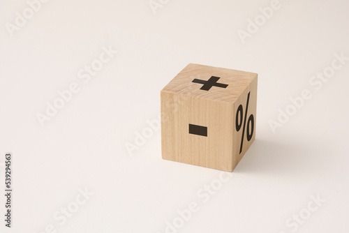flipping wooden cube block to change minus sign to plus sign on white background. positive thinking and mindset concept.