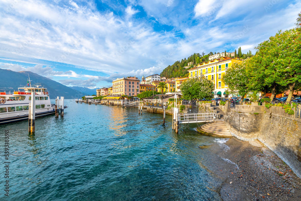 A ferry arrives at the dock in the colorful Italian village of Bellagio, Italy, on the shores of Lake Como.