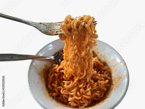Noodles in a bowl ready to eat isolated on a wooden table