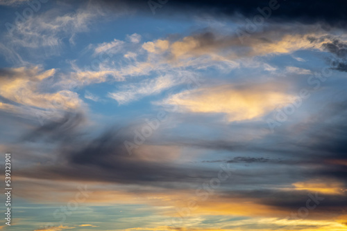 Sunrise dramatic sky with clouds in a row, colorful cloudscape