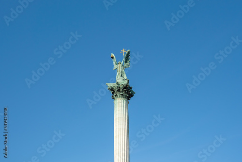 Archangel Gabriel Sculpture on top of the central column of the Millennium Monument at Heroes Square - Budapest, Hungary