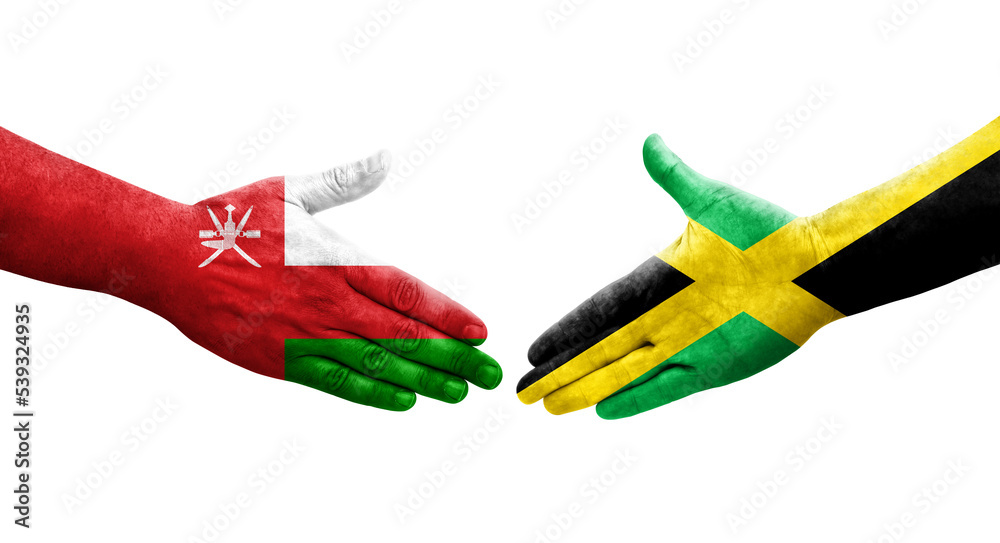 Handshake between Jamaica and Oman flags painted on hands, isolated transparent image. Handshake between Jamaica and Oman flags painted on hands, isolated transparent image.