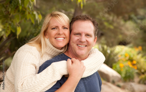 Happy Attractive Couple Emb...