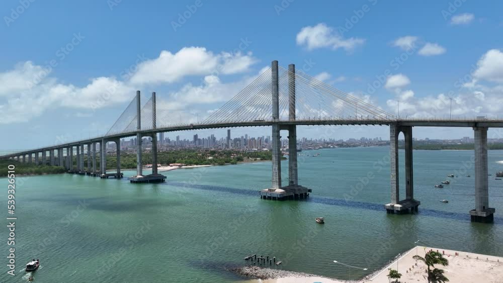Natal Rio Grande do Norte. Natal Brazil. Panning wide cityscape of Suspension Bridge at Natal capital city of Rio Grande do Norte. Brazil Northeast. Downtown aerial cityscape suspension bridge. Natal Rio Grande do Norte. Natal Brazil. Panning wide cityscape of Suspension Bridge at Natal capital city of Rio Grande do Norte. Brazil Northeast. Downtown aerial cityscape suspension bridge.