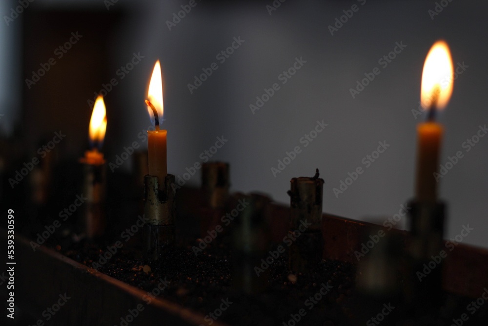 Church Candles lit up in the dark