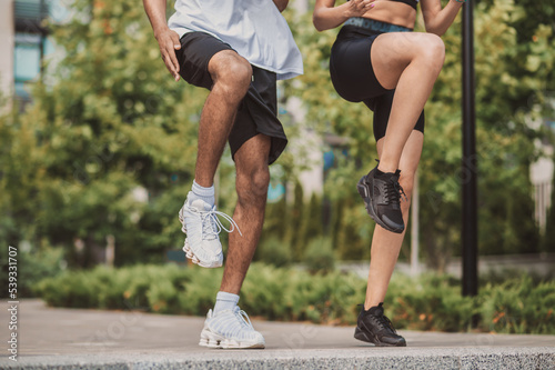Close up of young couple exercising together