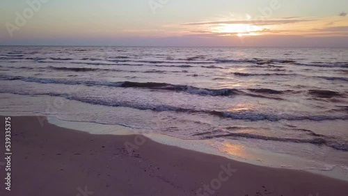 Wallpaper Mural Beautiful aerial establishing view of Baltic sea coast on a sunny evening, sunset, golden hour, beach with white sand, coastal erosion, climate changes, wide angle drone shot moving forward Torontodigital.ca
