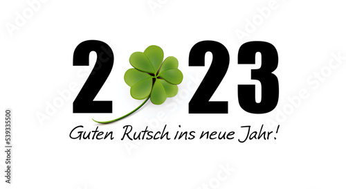 2023 Jahreszahl mit Kleeblatt und Handschrift - Guten Rutsch ins neue Jahr photo