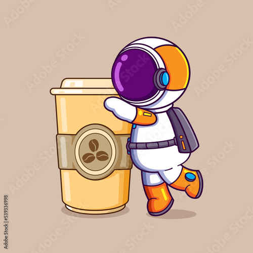 The thirsty astronaut is having a big cup of coffee and ready to drink it