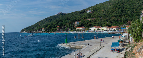 Moscenicka Draga, Croatia - August, 9, 2022 : Moscenicka draga village in the summer. Istria. Adriatic sea. Kvarner bay. Croatia. photo