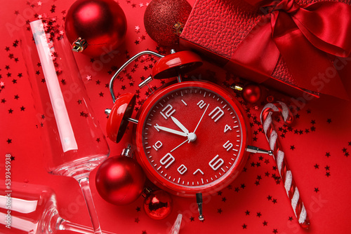 Red alarm clock with christ...