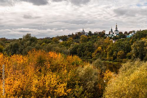 Autumn forest and view of the city of Vladimir. Russian typical landscape.