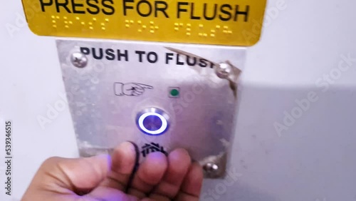 flushing at indian railway toilet from top angle