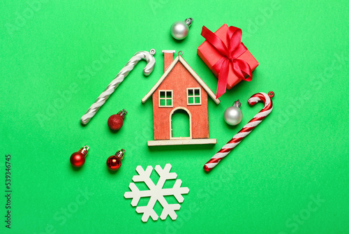 House figure with Christmas...