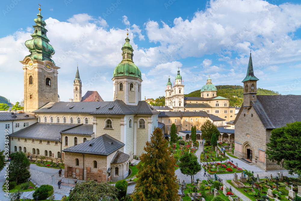View of the towers and skyline of Salzburg, Austria, from the 12th century catacombs and chapels of Saint Peter's Petersfriedhof Monastery, Cemetery and Catacombs.