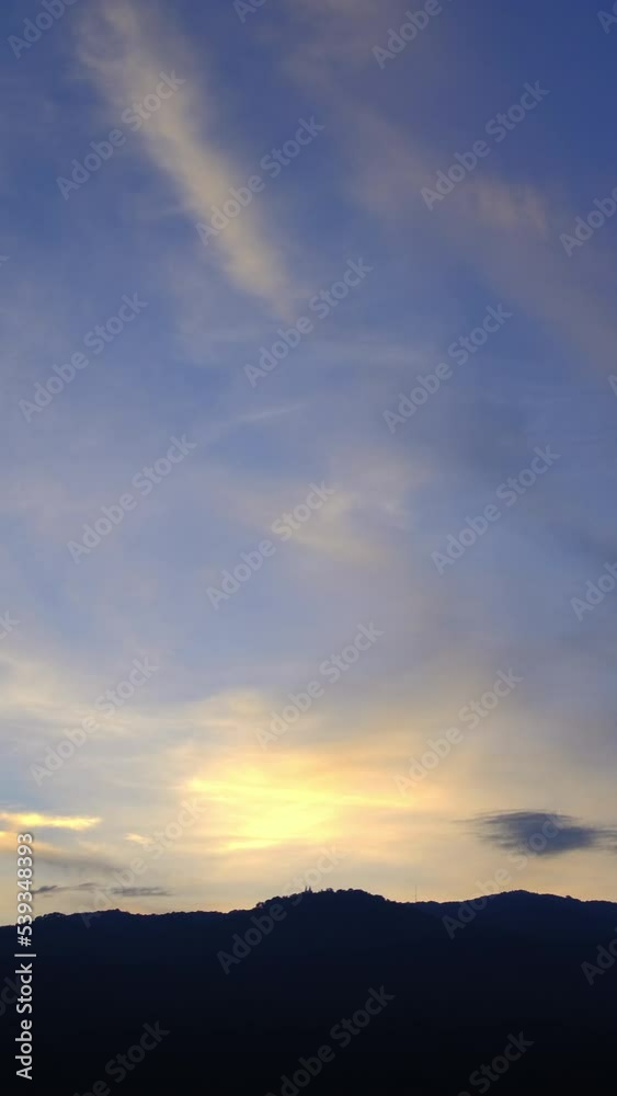 Twilight and dawn sky with cumulus cloud vertical time lapse in an evening. Twilight and dawn sky with cumulus cloud vertical time lapse in an evening.