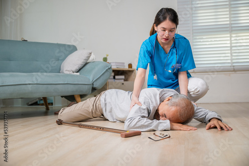 Fotografia Disabled elderly old man patient with walking stick fall on floor and caring you