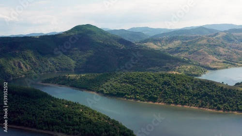 Slow flying over Rhodope mountains with Arda river passing through photo