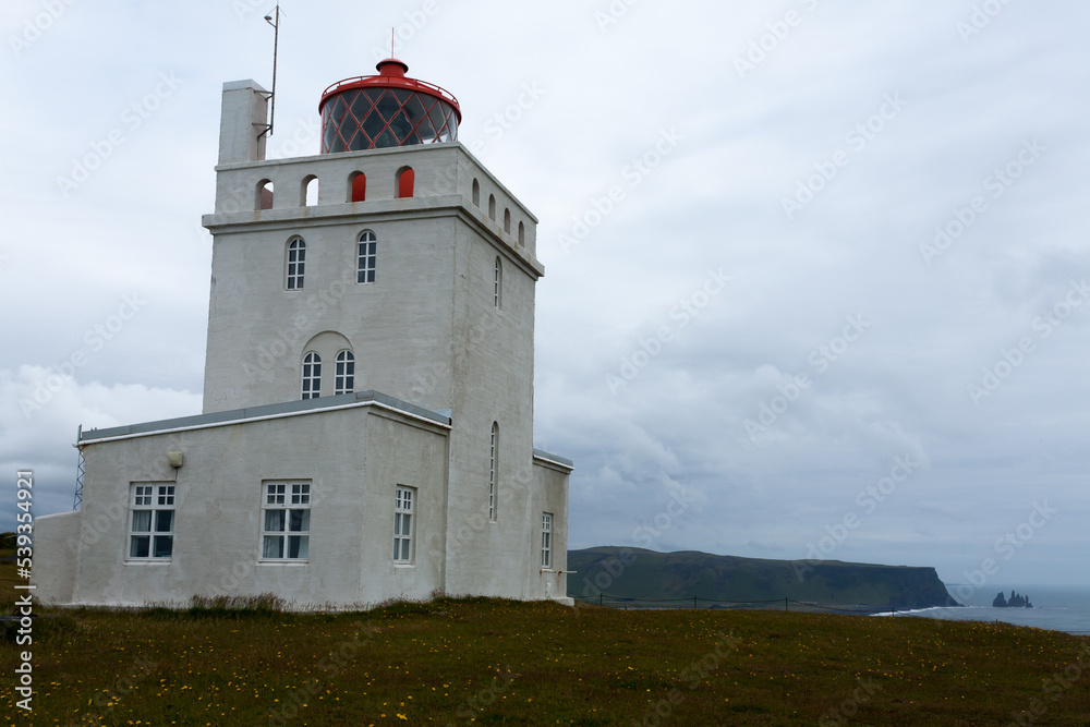 Dyrholaey lighthouse view. South Iceland landmark.