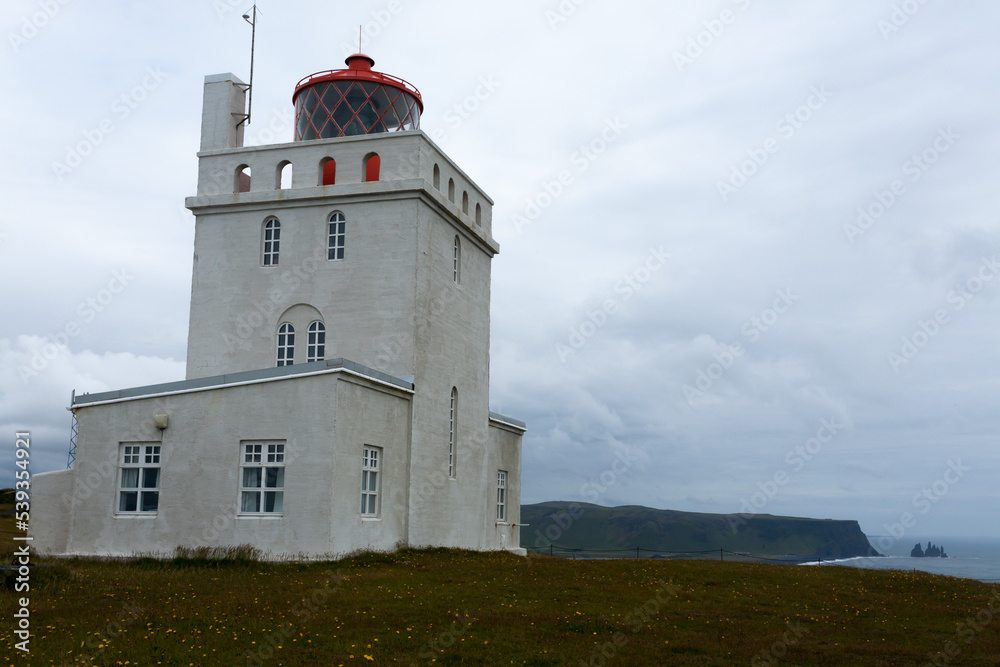 Dyrholaey lighthouse view. South Iceland landmark. Dyrholaey lighthouse view. South Iceland landmark.