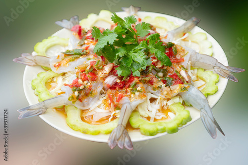 Close-up photo of shrimp soaked in fish sauce, spicy sauce