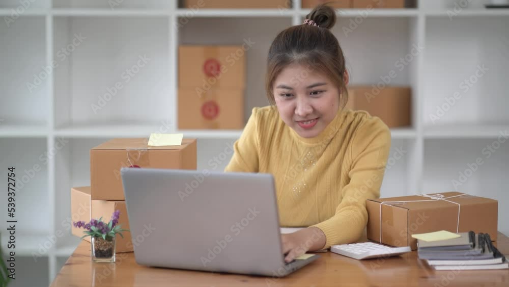 Asian teenager owner business woman work at home for online shopping and sale. Asian teenager owner business woman work at home for online shopping and sale.