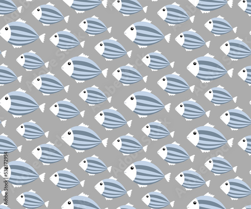 Striped fish of different sizes in pastel colors. Cute seamless pattern photo